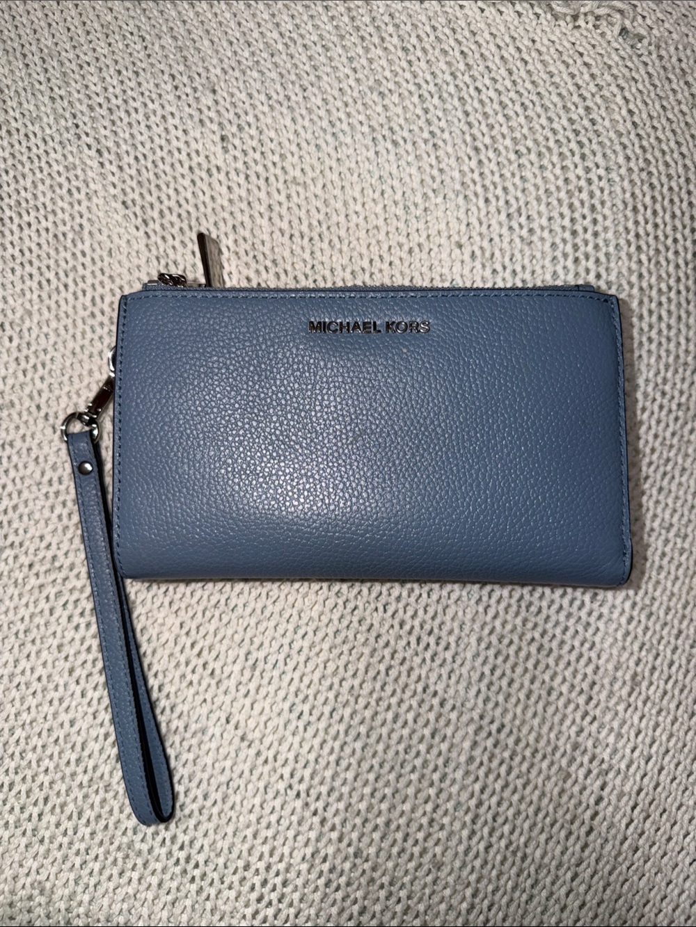 Michael Kors Blue Pebbled Leather Wristlet with silver Logo